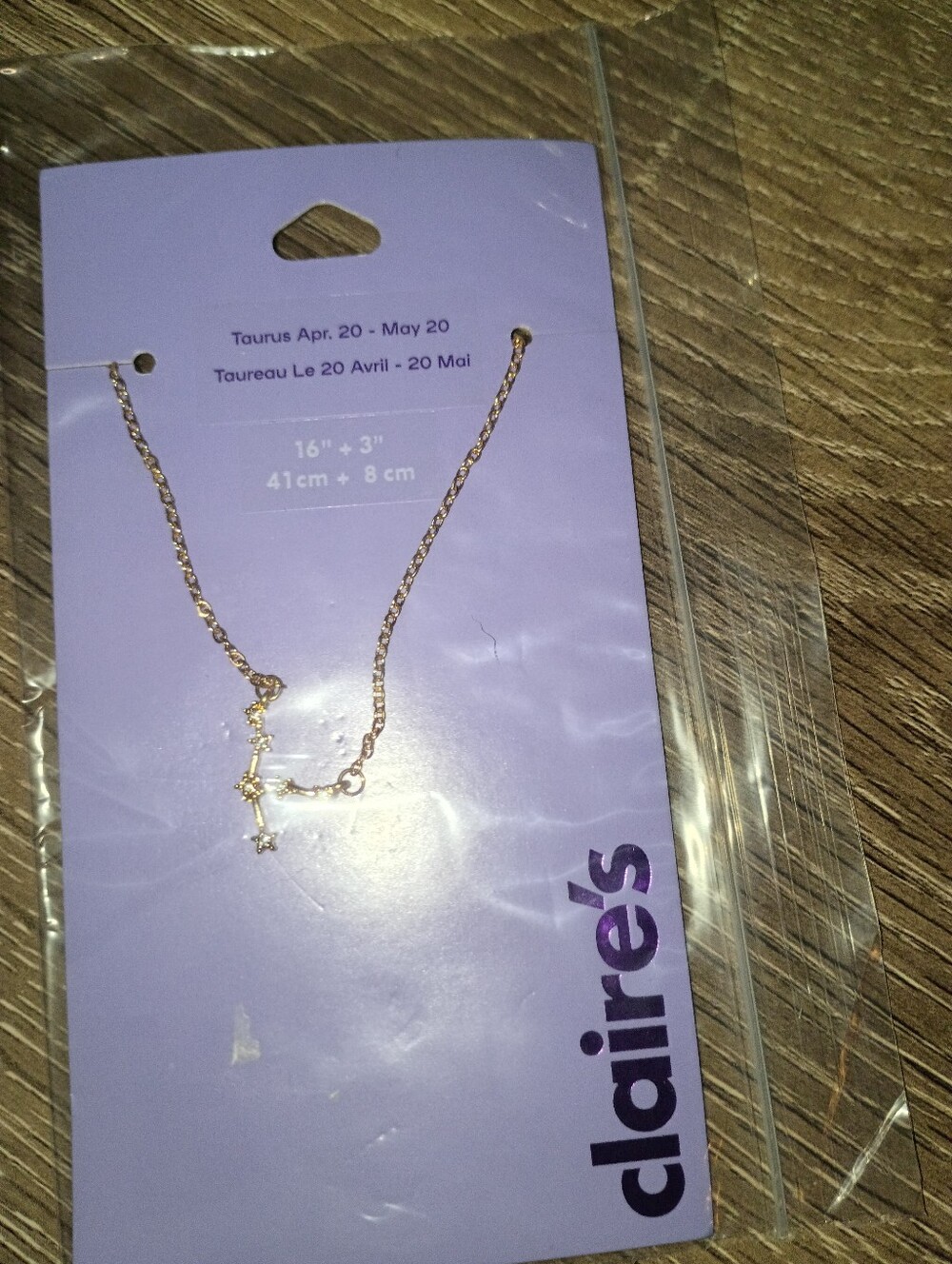 NWT Claire's Gold Taurus Constellation Necklace on Purple Card